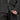Detail of black Mammut ski jacket hem, main zipper, and textured fabric with ski pants