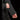 Black ski jacket underarm ventilation zipper open