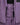 Internal storm flap and snap button closure detail on purple Mammut ski jacket