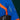 Blue sleeve vertical zippered pocket detail with waterproof flap and diagonal orange panel