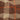 Close-up of soft woven brown beige orange plaid fabric texture