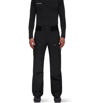 Men wearing Mammut Eiger Free Advanced black hardshell ski pants full front view