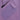 Lavender purple ski pants waistband close-up showing textured woven fabric panel and stitching