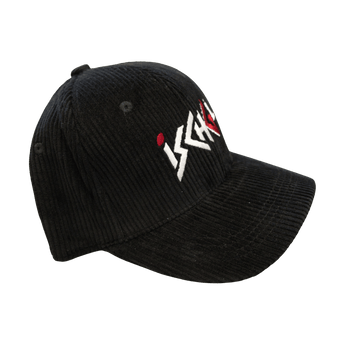 Close-up of black corduroy Ischgl cap showing raised white and red embroidery detail