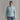 Women's light blue ORTOVOX down jacket front view with full-length zipper