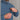 Close-up of blue jacket vertical zippered chest pocket detail on ORTOVOX Ortler Metawool