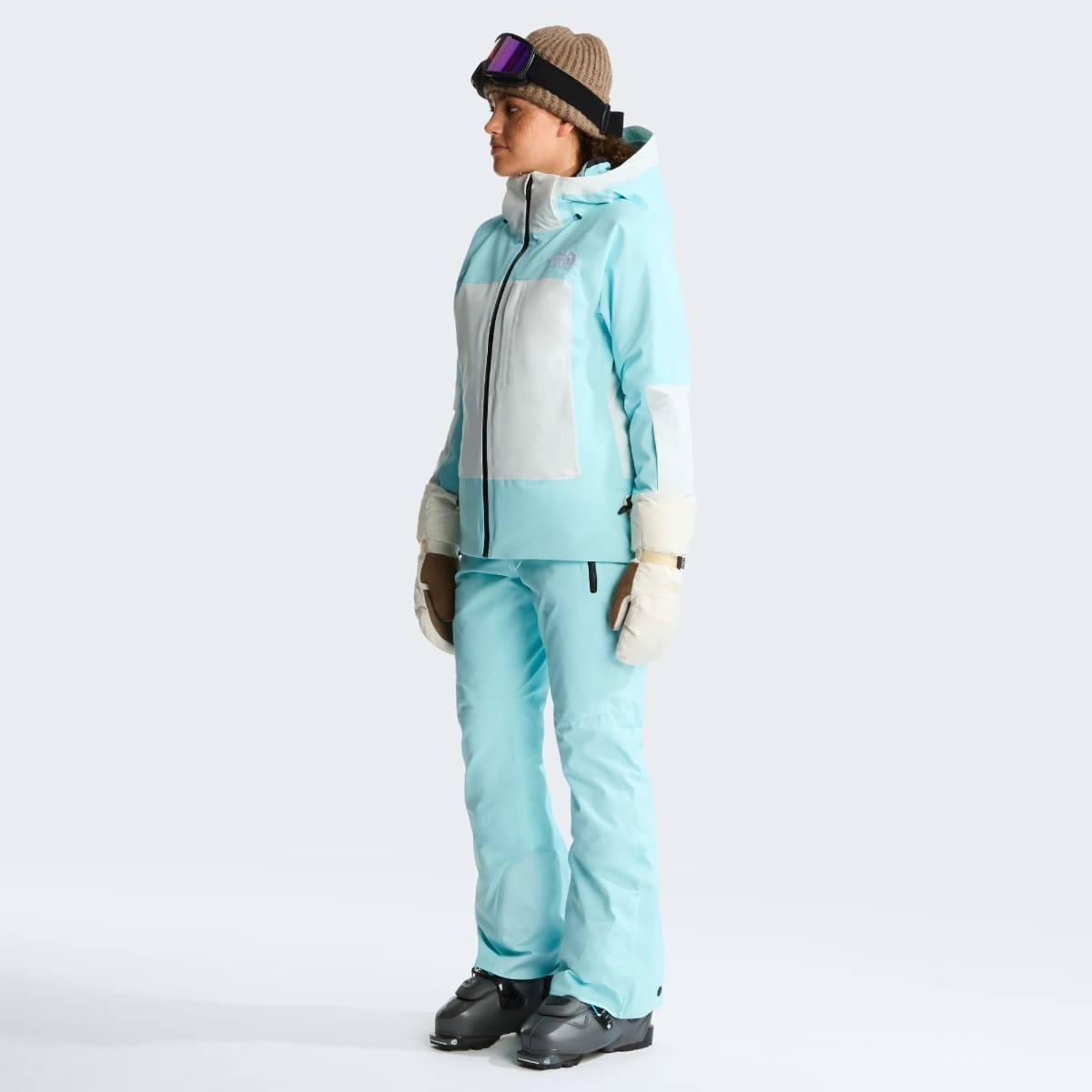 The North Face Lenado Pant W light blue straight-leg ski pants full outfit side view with jacket and boots