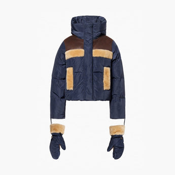 Flat lay of navy blue quilted puffer jacket with brown faux fur accents
