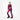 Full body model wearing Goldbergh Manga Pant W ski overalls and matching top with black boots on white background