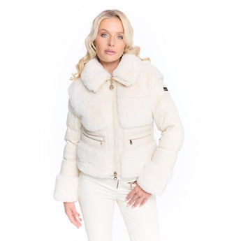 Close-up of gold zipper pulls and shearling texture on jacket