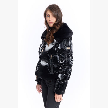 Black puffer jacket with fur collar, gold zippers, and arm patch