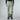 Model wearing size M The North Face Chakal Pant M in muted green with straight-leg fit
