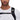 Close-up of black Mammut backpack strap mesh texture and branded buckle