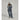 Woman opening dark blue ORTOVOX Ravine Plus ski jacket to show matching snow pants and orange zipper pull