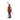 Person wearing maroon Ortovox Powder Rider 16 backpack with skis over shoulder in white studio