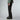 Full length profile of The North Face Descendit black men's ski pants with boots