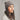 Woman wearing Ortovox Deep Knit Beanie grey beige striped fit
