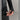 Close-up of ribbed cuff on black Ortovox merino fleece jacket