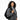 Black plush faux fur handbag held with herringbone coat