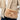 Tan Barts faux fur shoulder bag close-up with metal hardware and brand label