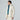 Unzipped The North Face Descendit Jkt W cream women's ski jacket revealing teal fleece layer