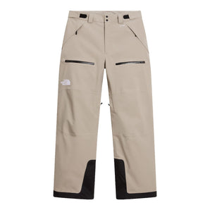 Beige The North Face Chakal snow pants flat lay showing zippered pockets and waistband