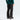 Back view of black The North Face Chakal ski pants on model with teal top