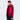 Woman wearing burgundy red color-block ski jacket side profile partially unzipped