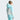 Woman wearing The North Face Lenado Jkt W light blue white color-block ski jacket side profile
