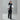 Man modeling white and black color-block Dot Out Pluma hooded puffer jacket front view