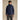 Full-body front shot of person in dark navy Arcteryx Atom Hoody M with hood up
