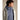 Blue-gray Arcteryx Atom Hoody M layered under beige outer shell jacket for cold weather