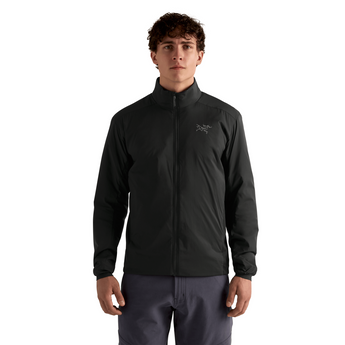 Close-up of men's black Arcteryx midlayer jacket fit and logo