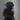 Salomon Husk Pro matte black ski helmet paired with blue-green mirrored goggles