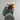 Person wearing beige Salomon Arcane Prime MIPS helmet with ski goggles