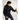Black Arcteryx Atom Hoody M worn during trekking with hydration pack and poles