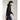 Men wearing black Arcteryx Atom Hoody M midlayer while walking outdoors with hood up